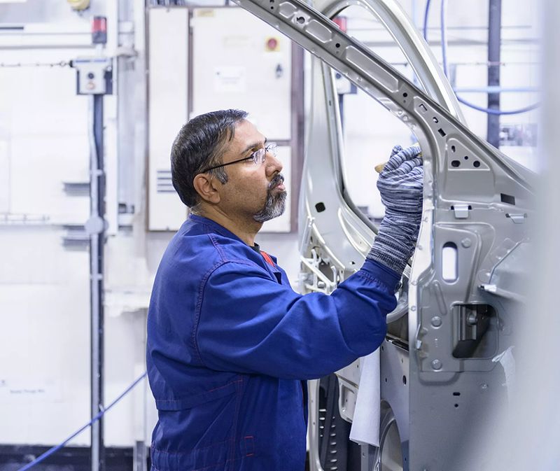 Man on production assembly line